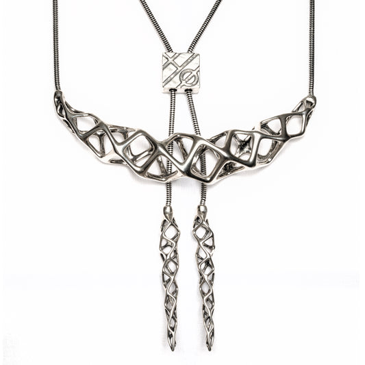 This solid sterling silver necklace is an original Xover0 concept. It is a hybrid between a bolo tie and a choker. Hence the name boker. 