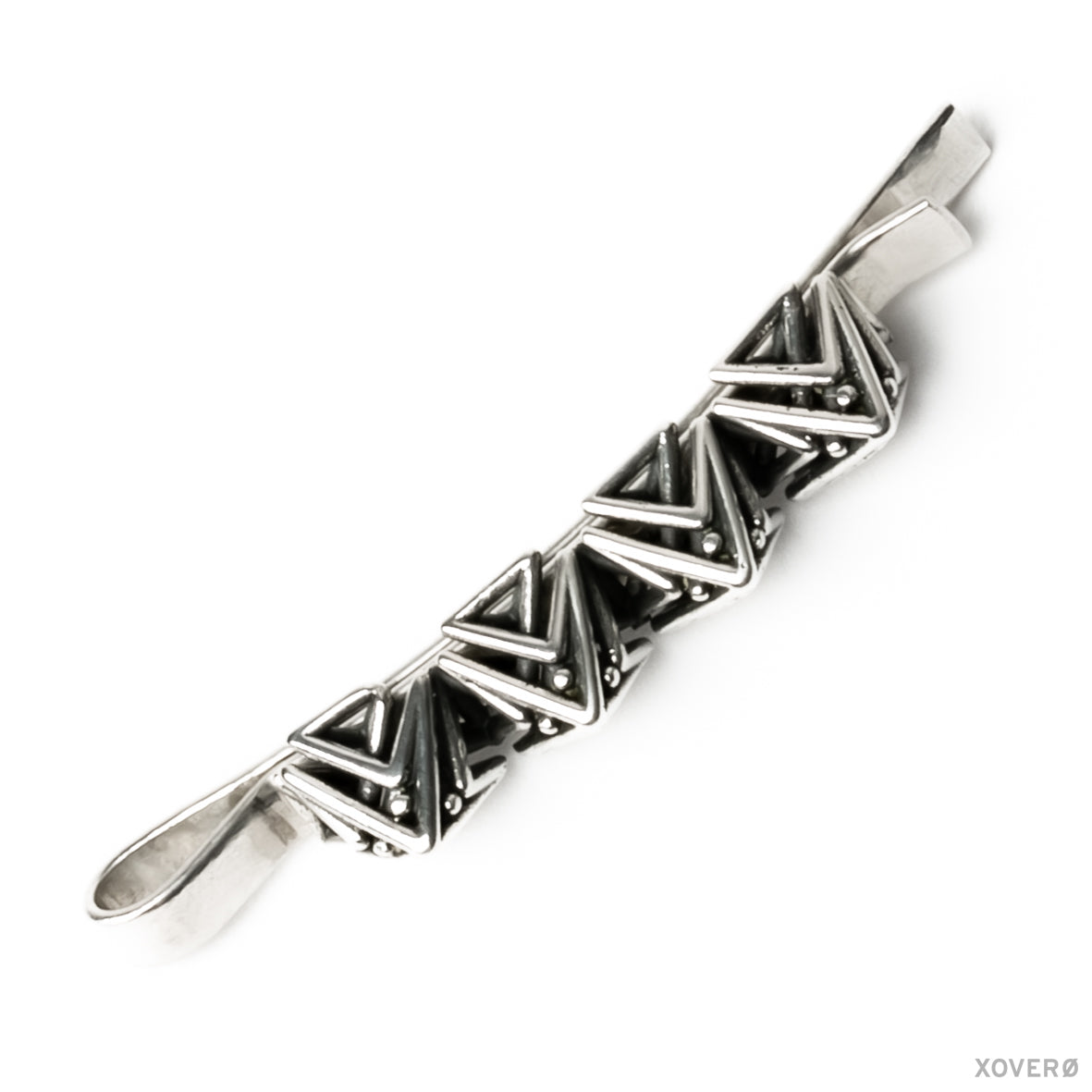 Sculptural heirloom hair jewelry crafted from solid sterling silver with hand formed pin and four detailed lattice spikes evoking Art Deco architecture. 