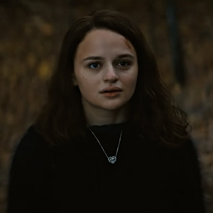 In Netflix's Uglies, Joey King as Tally Youngblood showcases the Geoheart Pendant Necklace.. The sparkling solid sterling silver heart pendant contrasts beautifully against the film's dark, warm fall color palette.