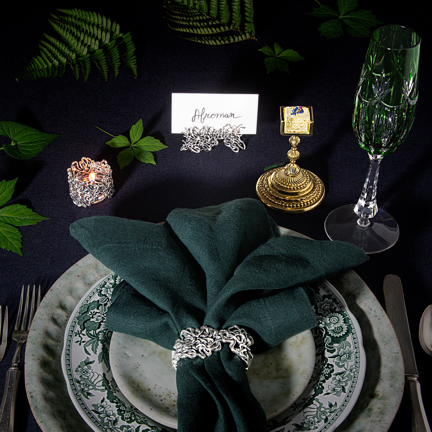 A formal dining table set for Afroman including the gold weed gummy chalice which holds a lemon pound cake flavored edible. 