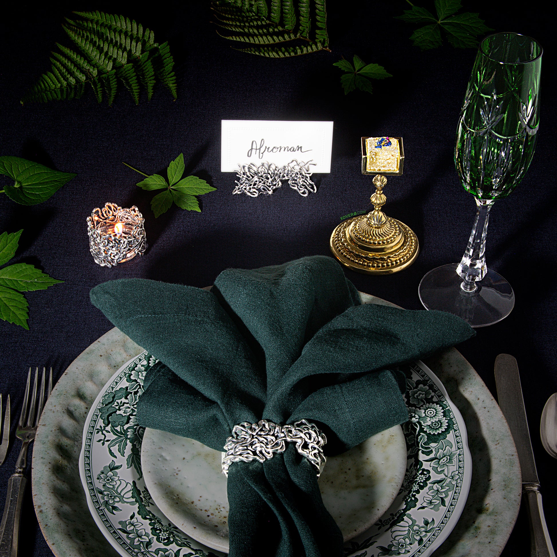 A formal dining table set for Afroman including the gold weed gummy chalice which holds a lemon pound cake flavored edible. 