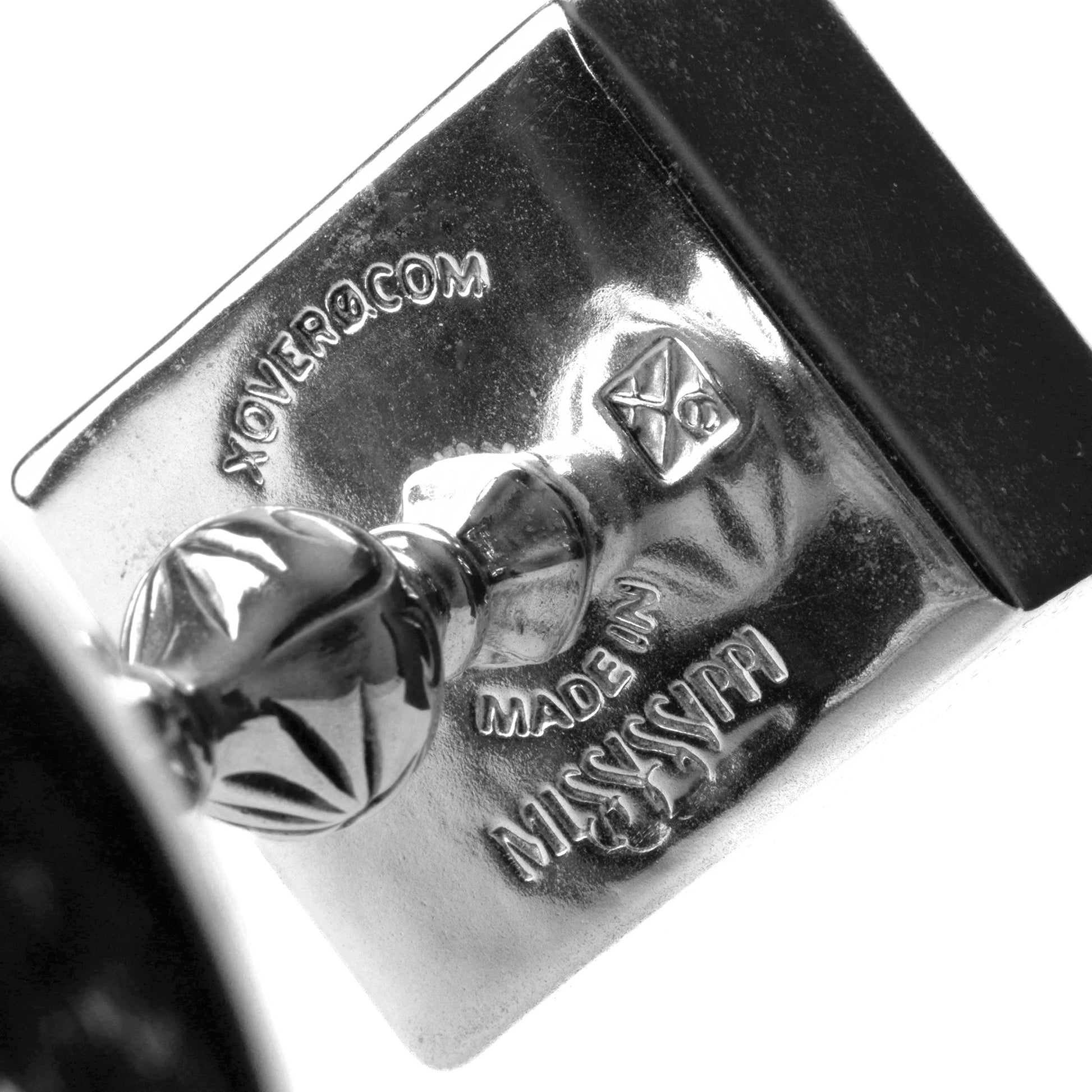 Close up of Xover0s makers marks on the underside of the weed gummy chalice. This objet d'art is made in Mississippi by artisans. 