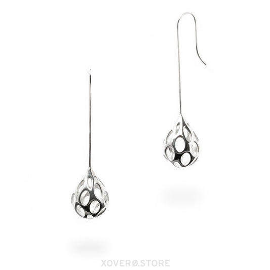 Long dangle earrings made of solid .925 sterling silver. The rain drop shaped motifs are hand soldered to long-stemmed sterling french hook for a seamless finish.  